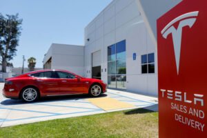 Tesla annual deliveries fall for first time as competition hurts demand By Reuters