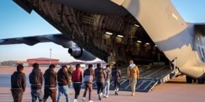 Trump’s White House says deportation flights are underway, posting pictures of people being loaded into US Air Force C-17s