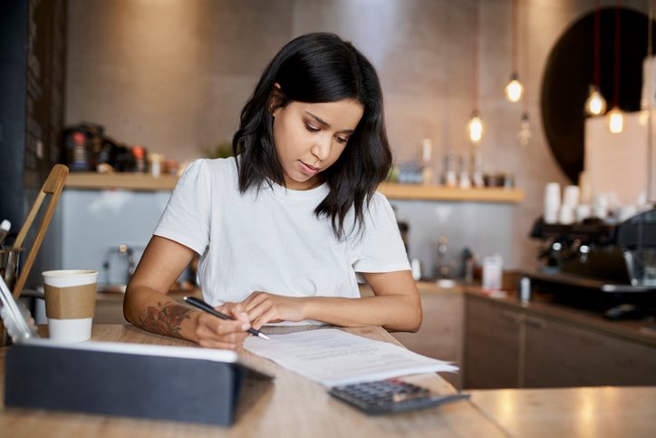A woman applying for a tax credit.