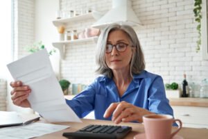 I’m 63 With 0k in an IRA. Should I Convert k per Year to Avoid RMDs and Taxes in Retirement?