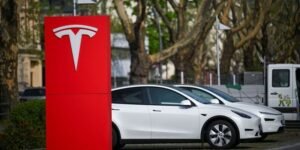 Elon Musk Says Tesla FSD Now Lets Drivers Use Phone in Some Cases