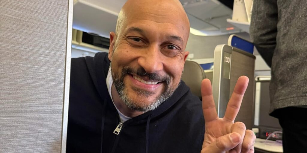 Someone asked to switch our business seats on a plane. I said yes, and got to take photos with one of my favorite celebrities.