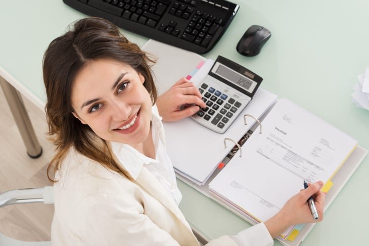 happy woman working at desk
