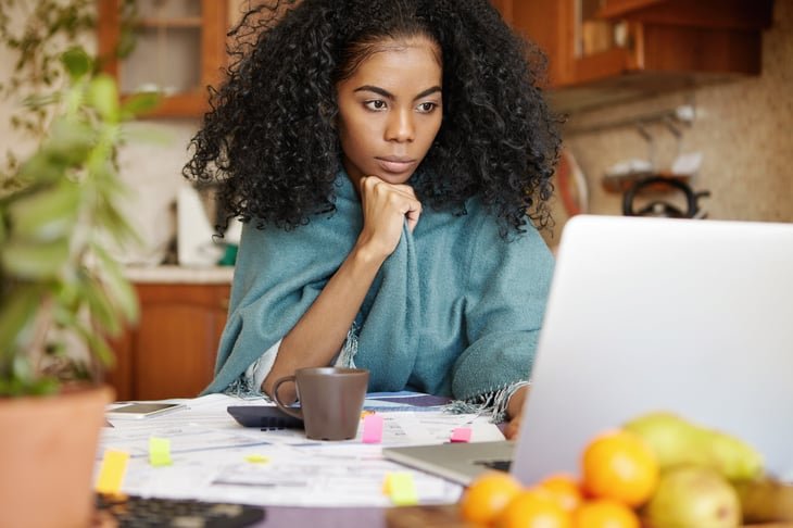 Woman paying bills