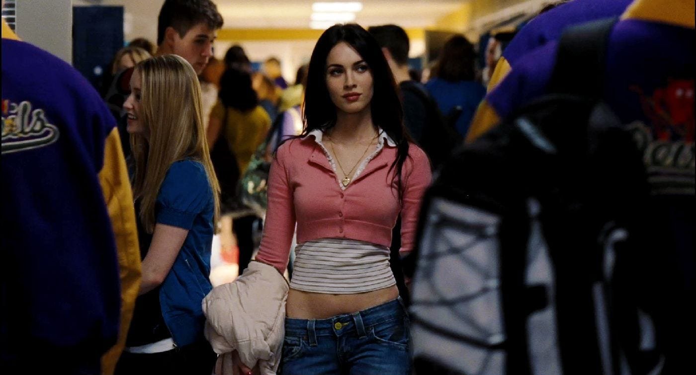 Megan Fox walking down a high school hallway