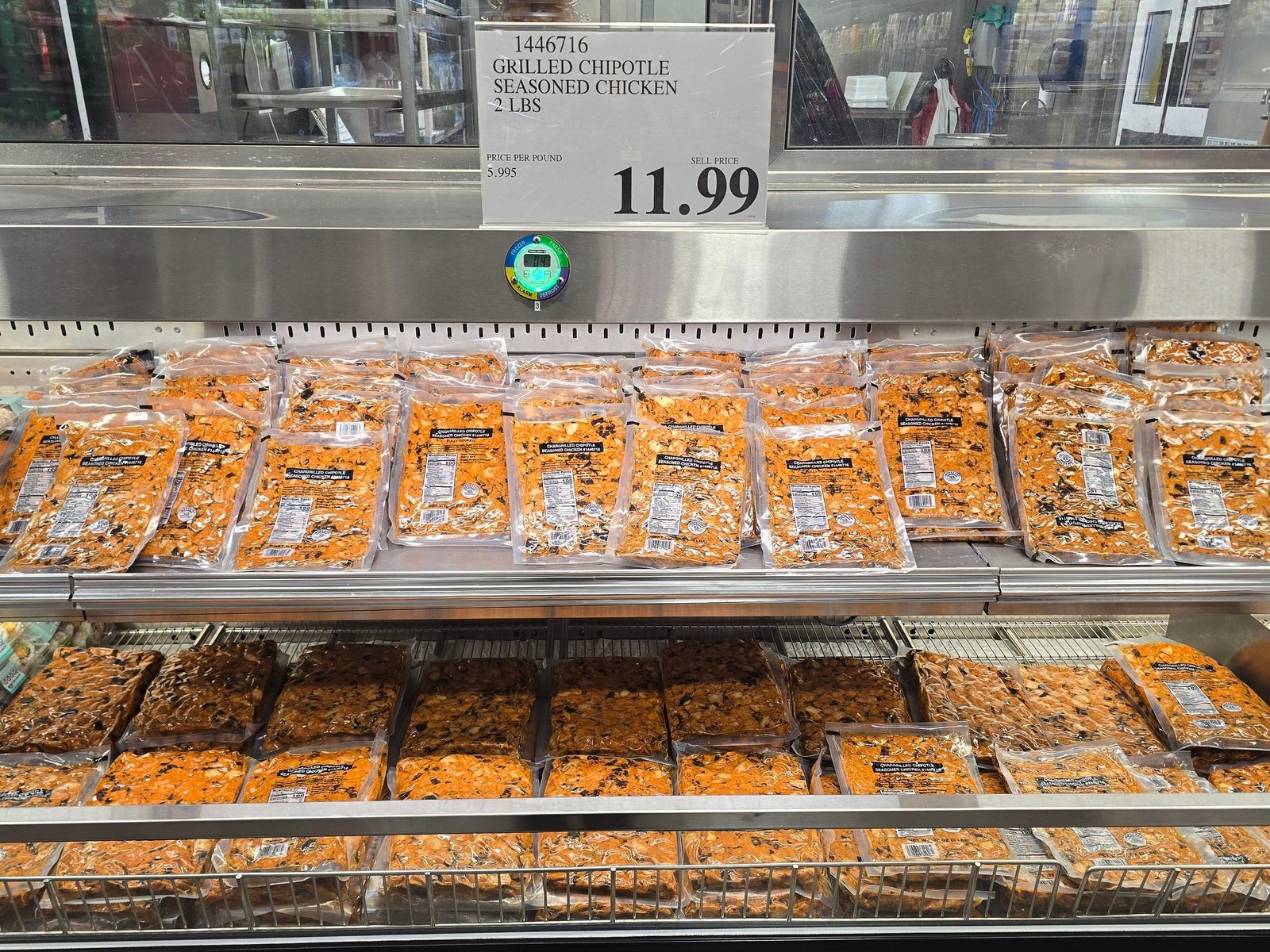 Packages of Chipotle-seasoned grilled chicken on display at Costco.