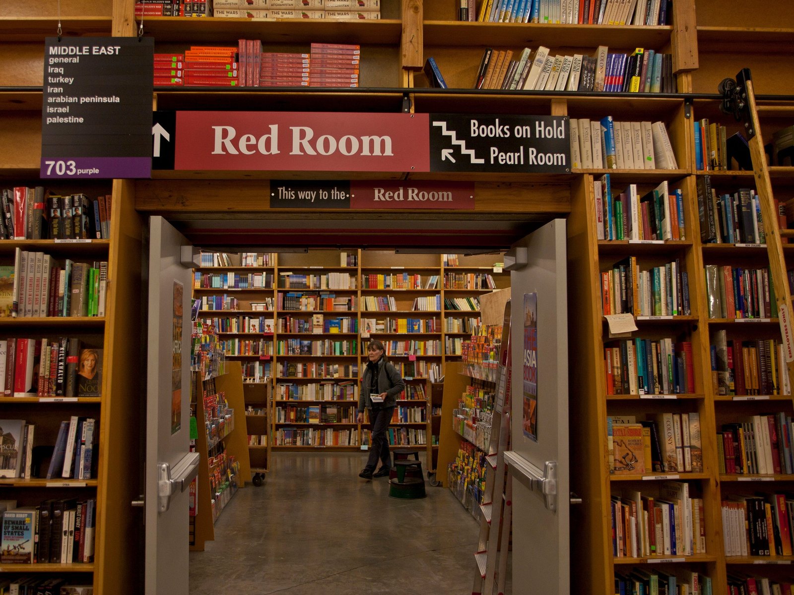 A sign directing patrons to the "red room" in Powell's Bookstore in Portland, Oregon,