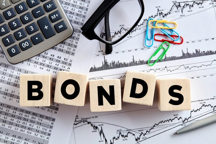 Wooden tiles spelling out "bonds."