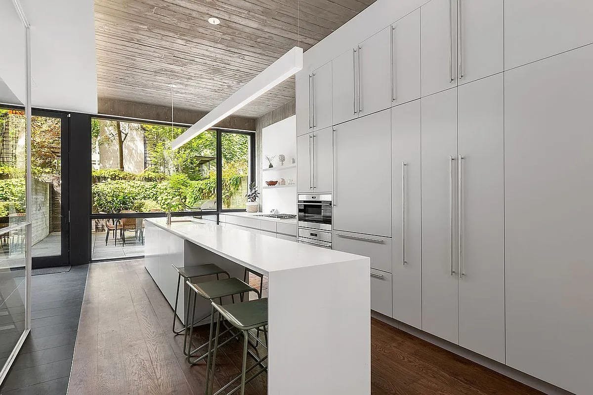 A kitchen inside 3 Wythe LN in Brooklyn, a home listed with Anthropic shares as a buying option.