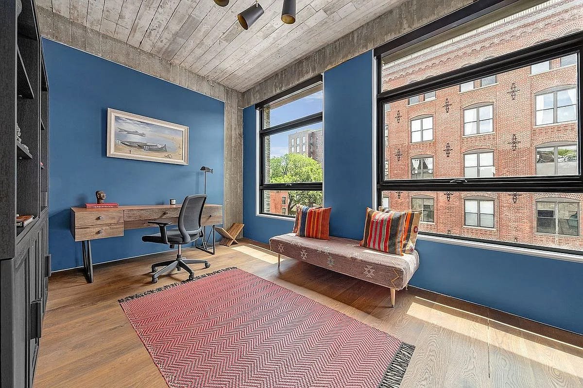 A bedroom of 3 Wythe LN in Brooklyn, a home listed with Anthropic shares as a buying option.