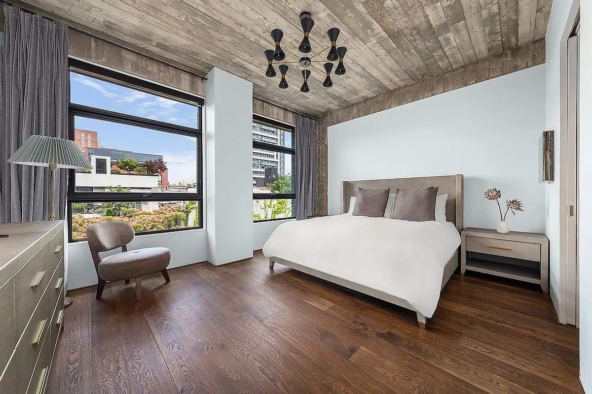 A bedroom of 3 Wythe LN in Brooklyn, a home listed with Anthropic shares as a buying option.