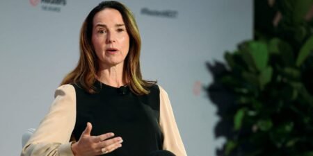 OpenAI’s CFO says she can’t say if Jony Ive’s device is an earpiece