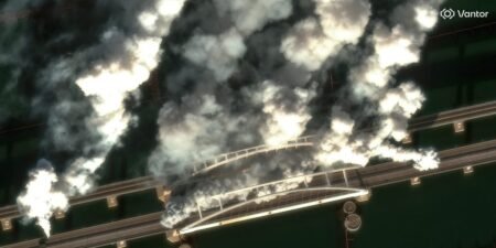 Satellite images show Russian forces throwing up smoke screens on a key Crimean bridge as Ukrainian drones target supply lines