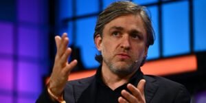 This CEO spent years betting on remote work. Now he’s evolving his stance because of AI.