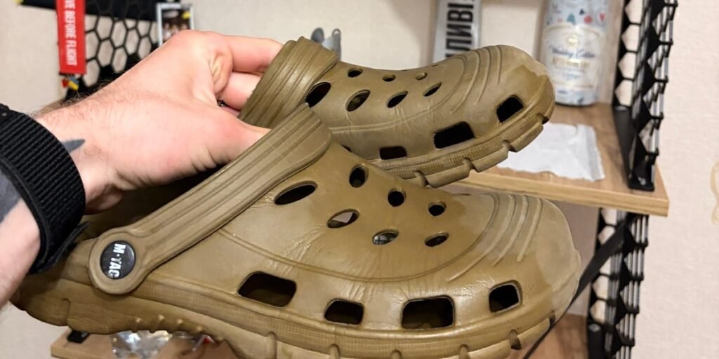 Ukrainian soldiers have been ditching combat boots for what they call ‘tactical Crocs’ when they’re off the front lines Ukrainian soldiers have been ditching combat boots for what they call ‘tactical Crocs’ when they’re off the front lines