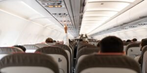 4 mistakes to stop making on a plane, according to an etiquette coach