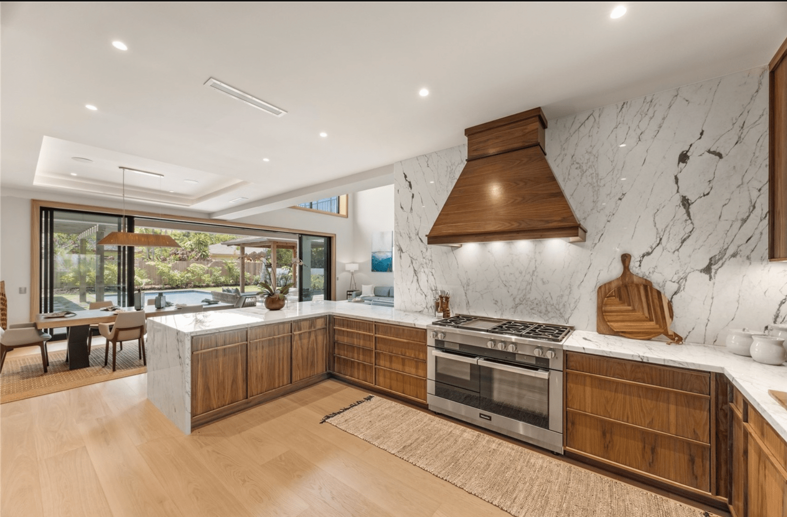 Luxury home kitchen with pool the rich barely use