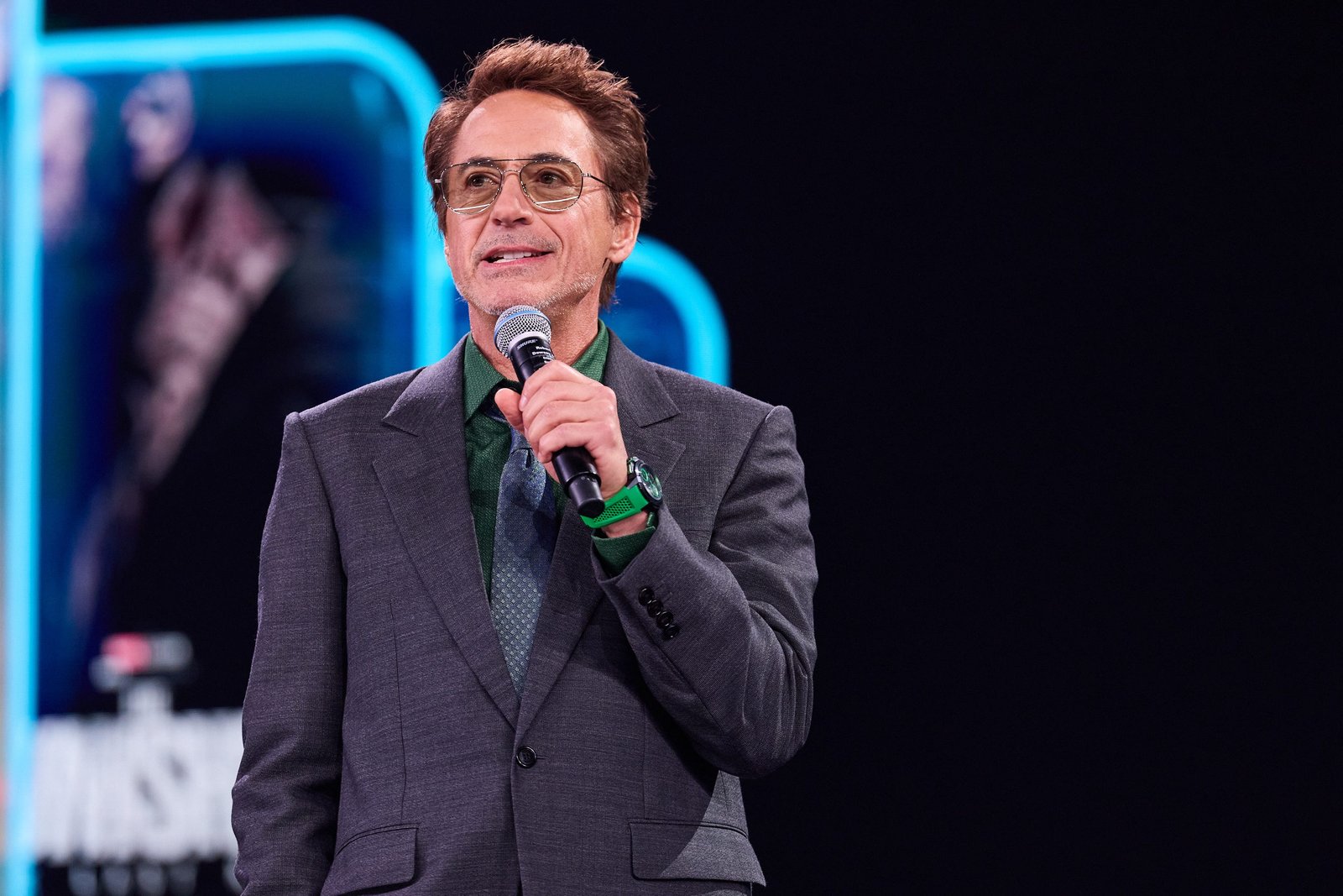 Robert Downey Jr. holding a microphone