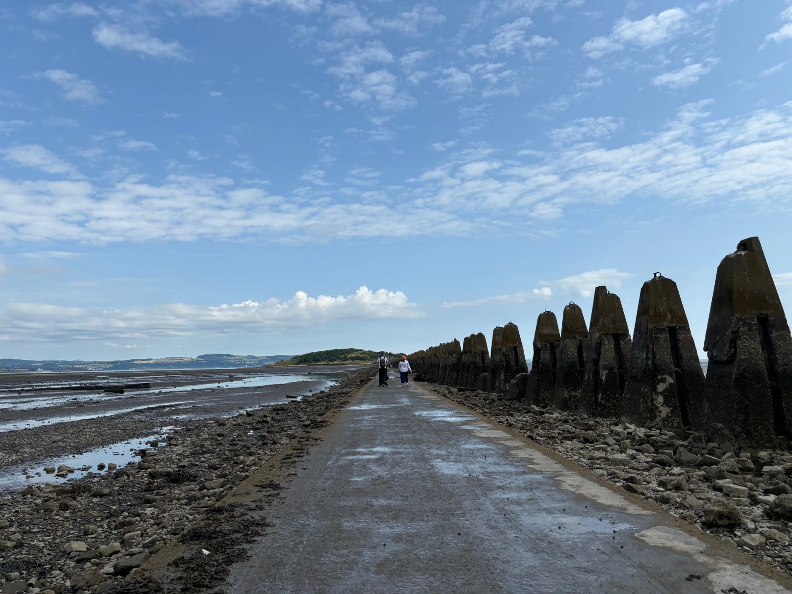 A wide shot of the walk to Cramond Island.