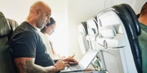 Elon Musk’s Starlink is dominating in-flight WiFi. Here’s which airlines have it — and how to check if your plane does.