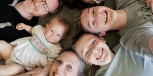 My partner and I had 4 boys between us. Our surprise daughter brought our blended families together.
