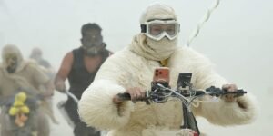 19 surreal photos show the mud, chaos, and glamour of Burning Man