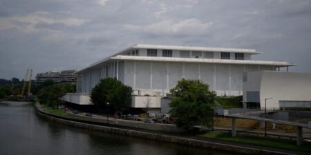 The Kennedy Center’s board voted to close until Trump’s name is added. Here’s a look at the history behind the landmark.